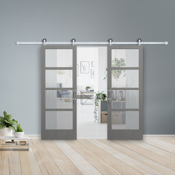 Modern 4-lite Glass Prefinished Driftwood Clear Coat Primed White Pine Wood Interior Bi-Part Barn Door with Satin Nickel Hardware Kit from Pacific Pride.