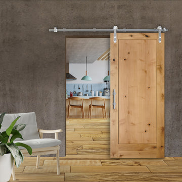 Rustic 1-Panel Unfinished American Knotty Alder Wood Interior Sliding Barn Door with Round Stainless Steel Hardware Kit from Pacific Pride.