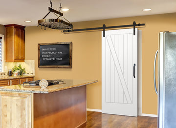 Cottage Z-Plank Primed White Pine Wood Interior Sliding Barn Door with Oil Rubbed Bronze Hardware Kit from Pacific Pride.